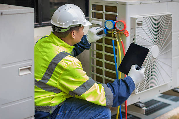 Professional Heat Pump Repair technician working in Grabill, IN